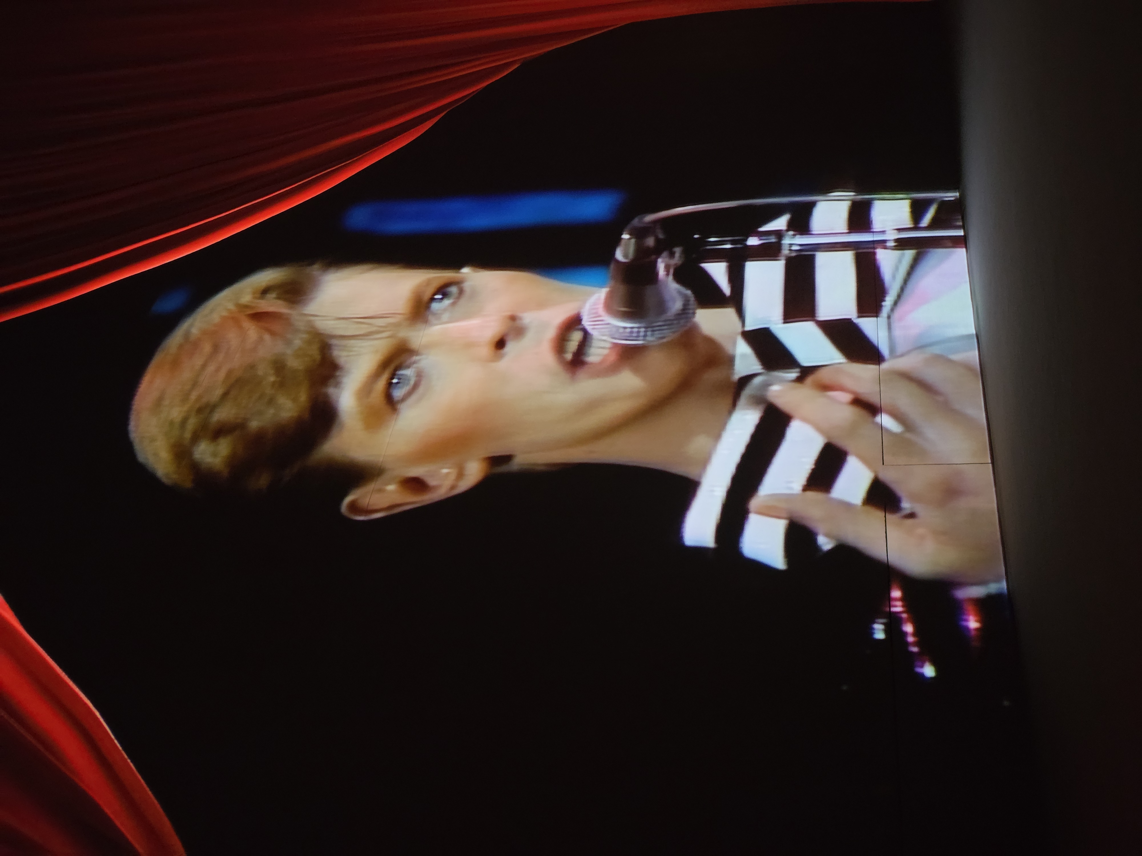 Close-up: Bowie in striped jacket